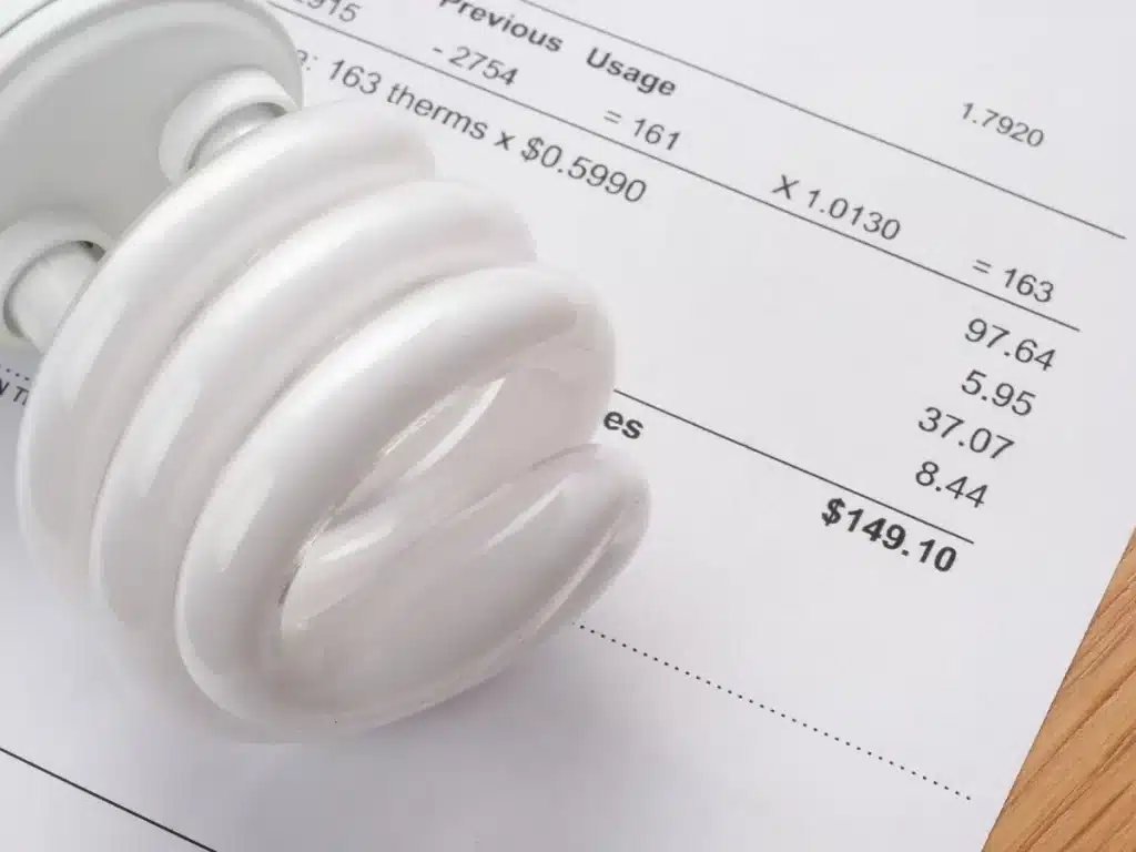 a white color bulb along with the electricity bill