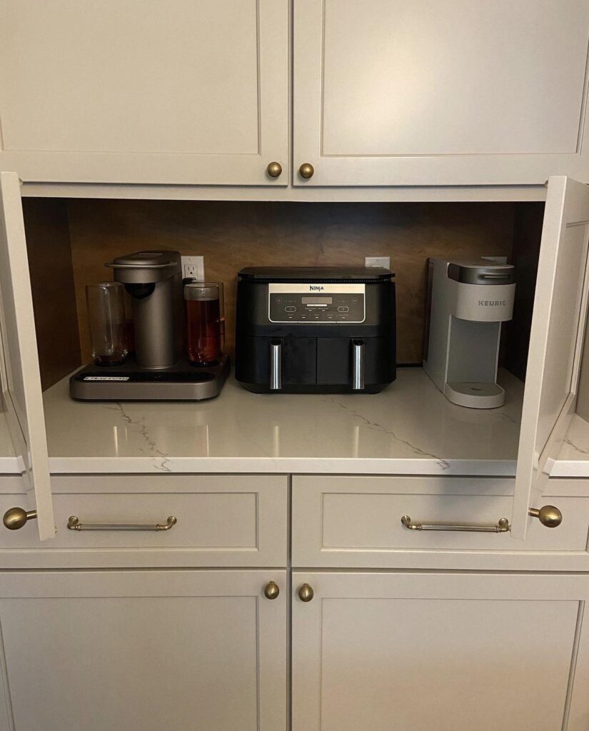 kitchen appliances in a cabinet