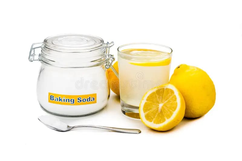 baking soda jar lemon juice glass and lemons