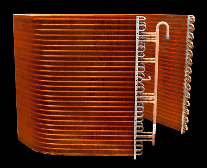 a zoomed image showing refrigerator condenser coils