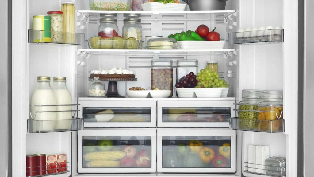 refrigerator doors open view showing proper storage of items