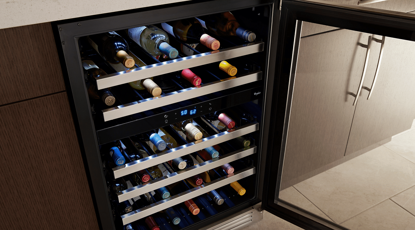 A view of some types of wine stored inside a refrigerator