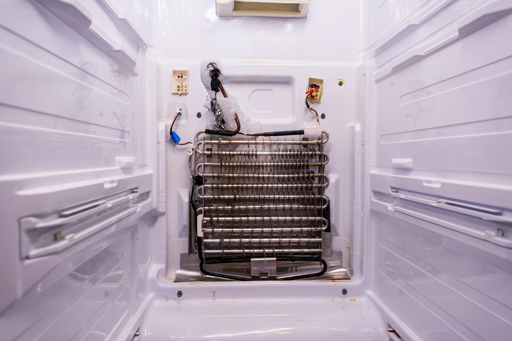 An inside view of a refrigerator evaporator coil