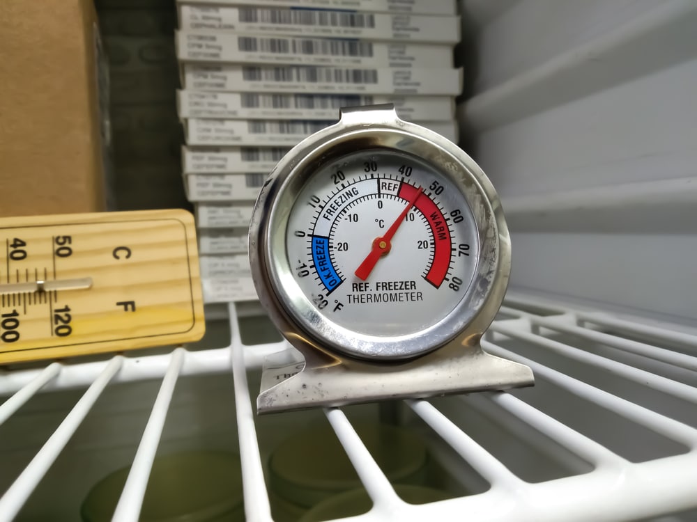 A view of a freezer thermometer inside a freezer