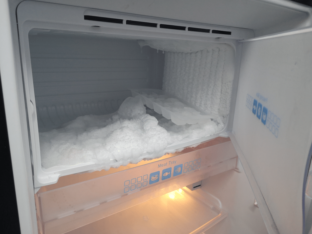 A view of a frozen icy freezer inside