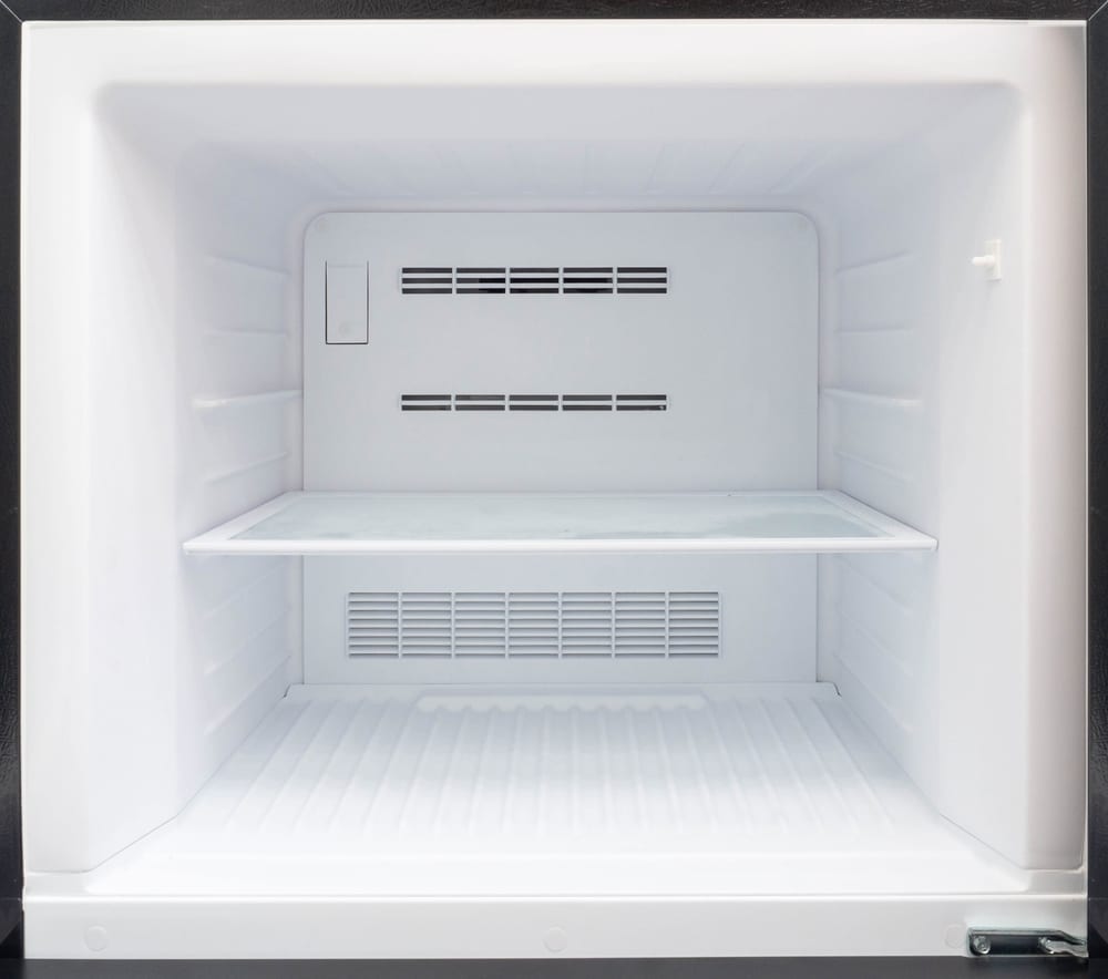 A view of the inside of a double door freezer